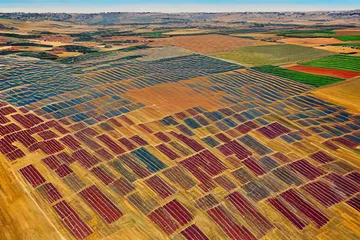 Solar panels in a hot African landscape